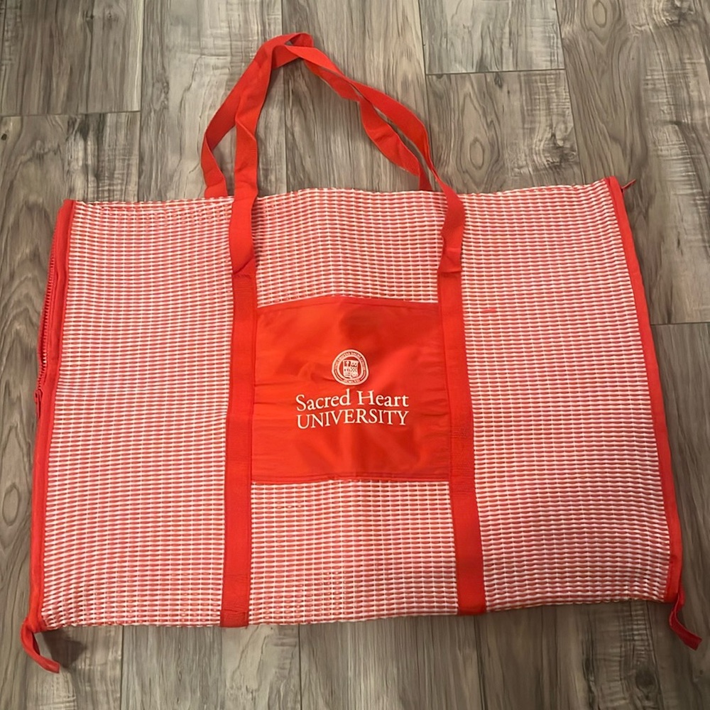 Sacred Heart university beach tote that turns into beach blanket with pillow